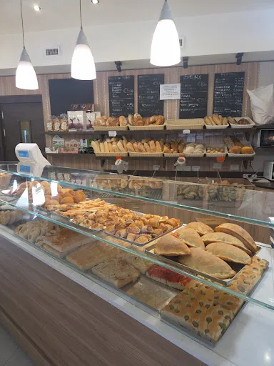 Foto di Panificio Pasticceria Artigianale - DA UN CHICCO ALL’ ALTRO - Pizze, Dolci e Torte per Feste.