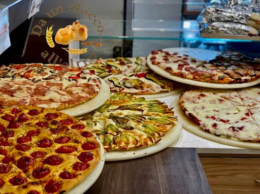 Foto di Panificio Pasticceria Artigianale - DA UN CHICCO ALL’ ALTRO - Pizze, Dolci e Torte per Feste.